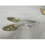 A pair of early 19th century fruit decorated spoons, hall marked for London 1823/24, maker R C.