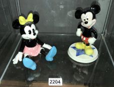 A Walt Disney musical Minnie Mouse & a Walt Disney Mickey Mouse