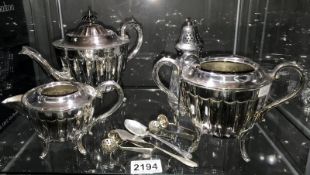 A silver plated tea service, sugar sifter & sugar tongs etc.
