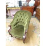 A Victorian mahogany framed cabriole leg chair.