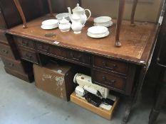 A Sheraton style desk with drop leaves