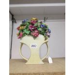 An English pottery flower arrangement.