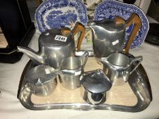 A 7 piece piquot ware tea set including tray