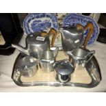 A 7 piece piquot ware tea set including tray