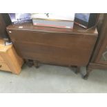 An oak gateleg table