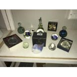 A collection of glass paperweights etc.