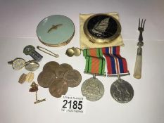 A mixed lot including medals, coins & powder compacts etc.