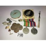 A mixed lot including medals, coins & powder compacts etc.