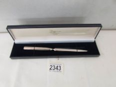 A hall marked silver-handle letter opener in case.