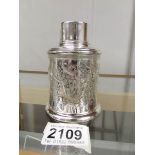 A silver lidded pot with engraving, hall marked for Birmingham 1911/12, approximately 96 grams.