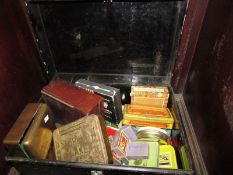 A tin trunk full of vintage cigarette and tobacco tins and boxes including rare examples.