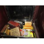 A tin trunk full of vintage cigarette and tobacco tins and boxes including rare examples.