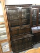 A dark oak wall unit/dresser