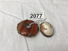 A Scottish banded agate brooch together with a cameo of a female profile