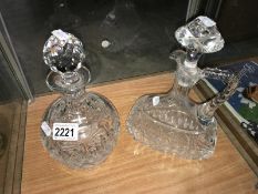 2 heavy cut glass decanters