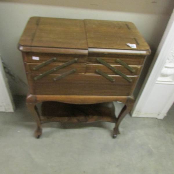 An old concertina sewing box.