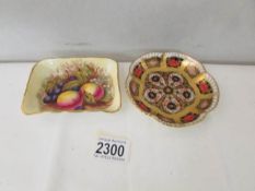 A Royal Crown Derby Imari pattern pin dish and an Aynsley fruit decorated pin dish.