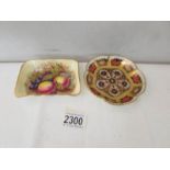 A Royal Crown Derby Imari pattern pin dish and an Aynsley fruit decorated pin dish.