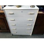 A white melamine bedroom chest of drawers