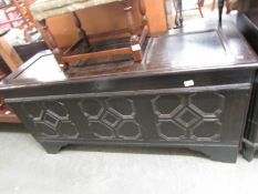 A large old oak coffer.