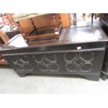 A large old oak coffer.