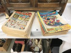 A quantity of vintage comics including Beano & Mickey Mouse etc.