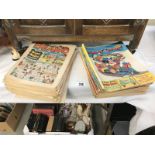 A quantity of vintage comics including Beano & Mickey Mouse etc.