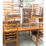 A set of 6 oak ladder back chairs comprising 2 carvers and 4 dining.