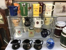 22 assorted breweriana water jugs by a variety of manufacturers including, Beswick, Wade etc.