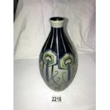 A Moorcroft peacock parade first quality vase