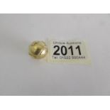 A 9ct gold charm in the form of a world globe, approximately 6 grams.