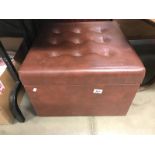 A leather covered storage box/foot stool/pouffe