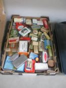 A collection of assorted tins including pharmacy related