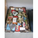 A collection of assorted tins including pharmacy related