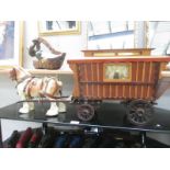 A large pottery shire horse with gypsy caravan