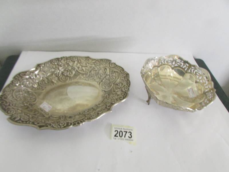 An ornate silver dish hall marked James Deakin & Sons,