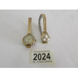 A 9ct gold ladies wrist watch on plated strap (in working order) and another ladies wrist watch
