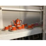 A 1930's Alfred Meakin orange glazed coffee set etc.