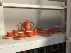 A 1930's Alfred Meakin orange glazed coffee set etc.