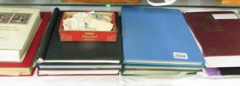 8 albums / stock books of assorted stamps including Britain,