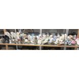 A good collection of shoe ornaments including Wedgwood, Royal Albert etc.