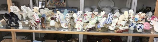 A good collection of shoe ornaments including Wedgwood, Royal Albert etc.