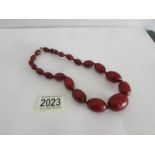 A fine red amber necklace.