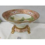 A fine Noritake bowl with hand painted landscape centre and on a three footed stand.