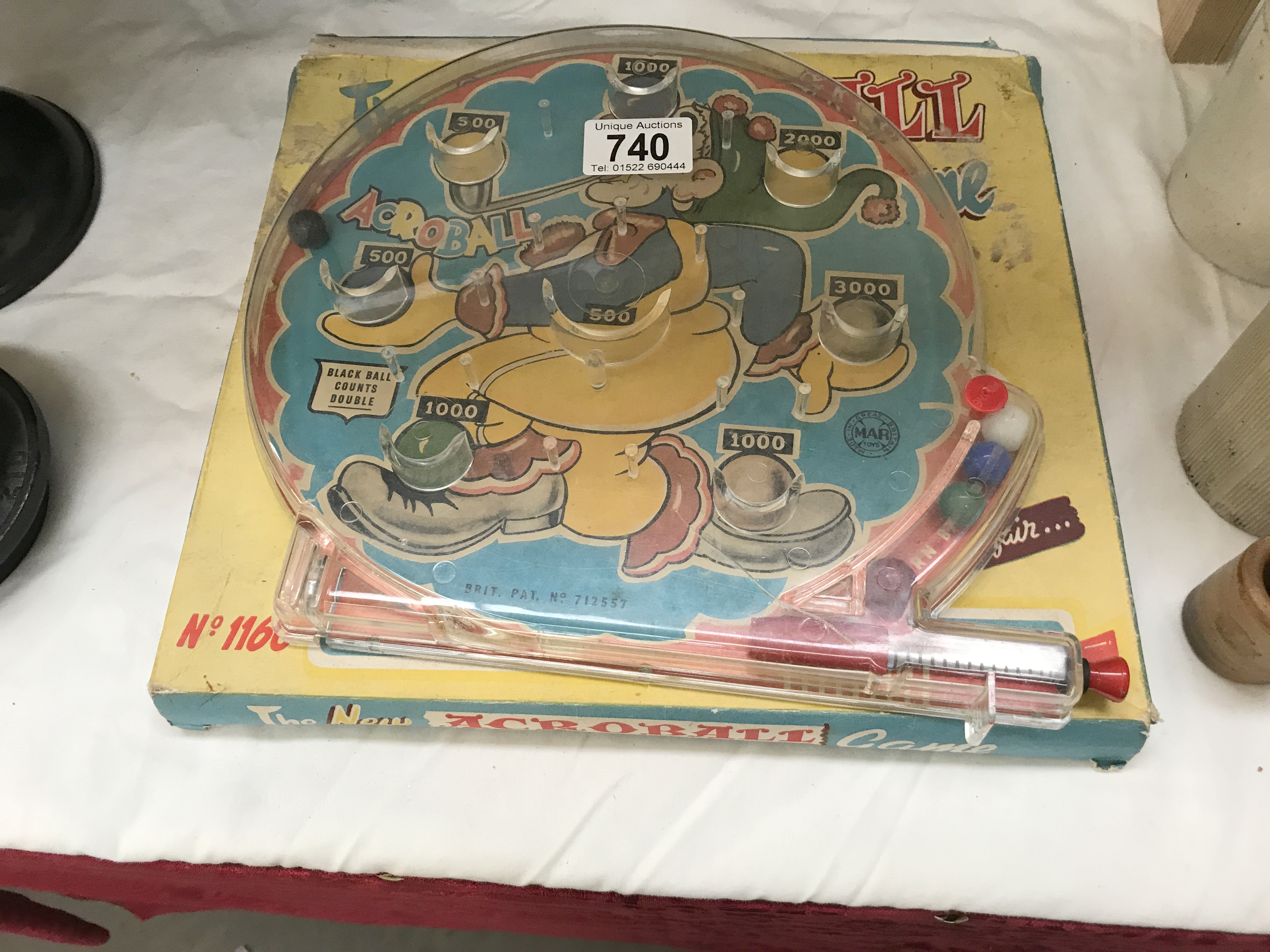 A vintage boxed acroball bagatelle type game