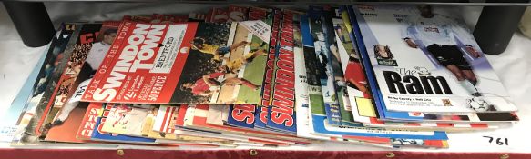 A quantity of 1980's football programmes including Swindon Town