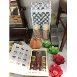 A quantity of candles including iron candle holder light & box of Yankee candles