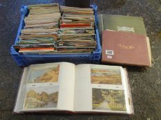 A quantity of vintage & modern postcards & empty vintage albums