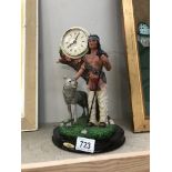 A Juliana clock with Indian figure & wolf