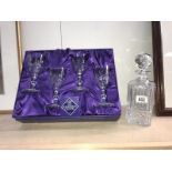 A boxed set of 4 Edinburgh crystal goblets & a decanter